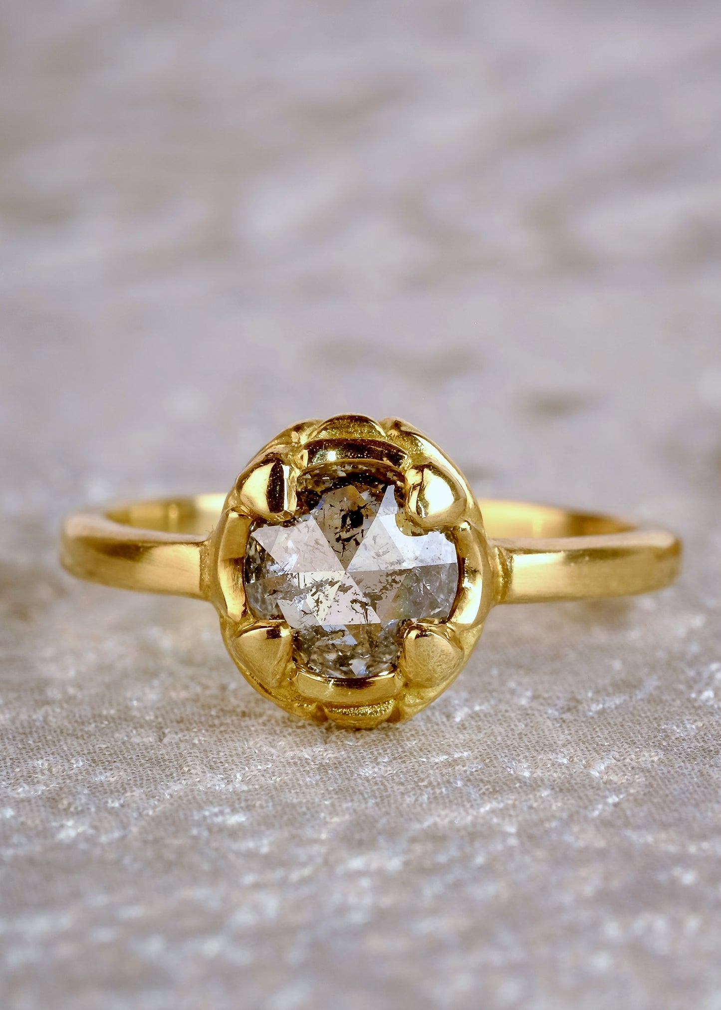 Named for Empress Josephine, this ring pairs perfectly with the Empress nesting band. Still stunning on its own, this ring features a rose cut diamond set securely within four prongs— a minimalist setting that marries a modern aesthetic with echoes of the past.