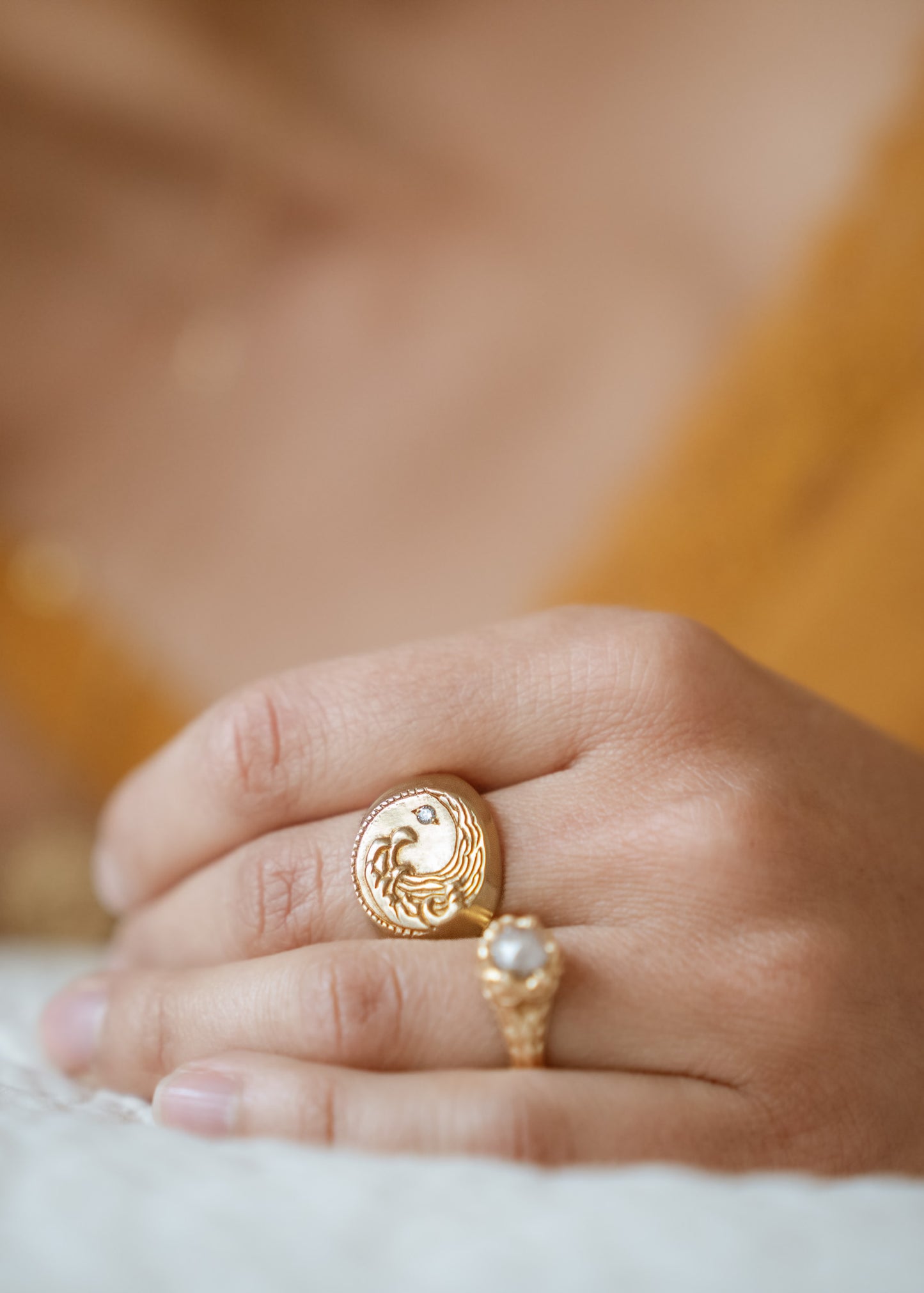 The eleventh sign of the Zodiac, air sign Aquarius is a deep thinker who wants to change the world. A hand-carved wave graces this pendant for a necklace that captures the power of the celestial sky.