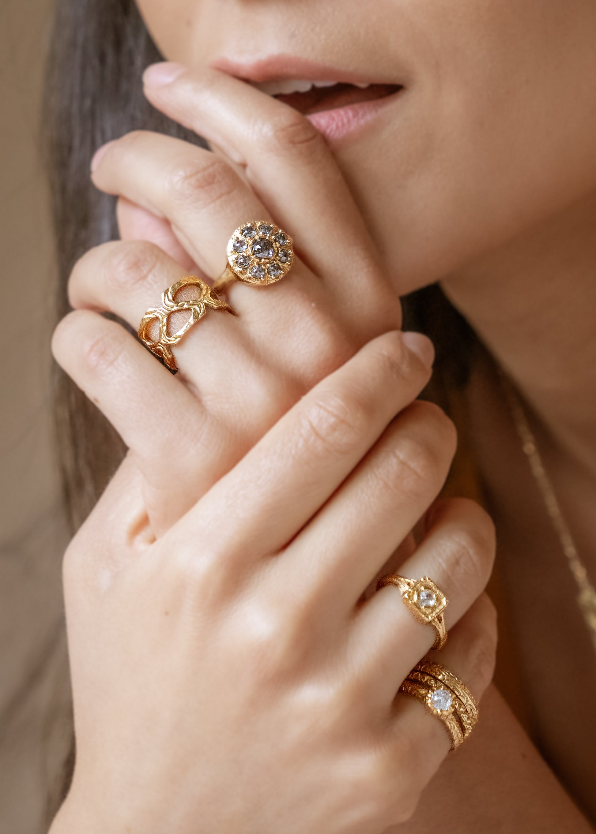 Modern lines intersect with an antique aesthetic to create the Chamber ring, a square setting of textured gold that houses a recessed rose cut diamond— strong and substantial, a meaningful connection to the past and present. 