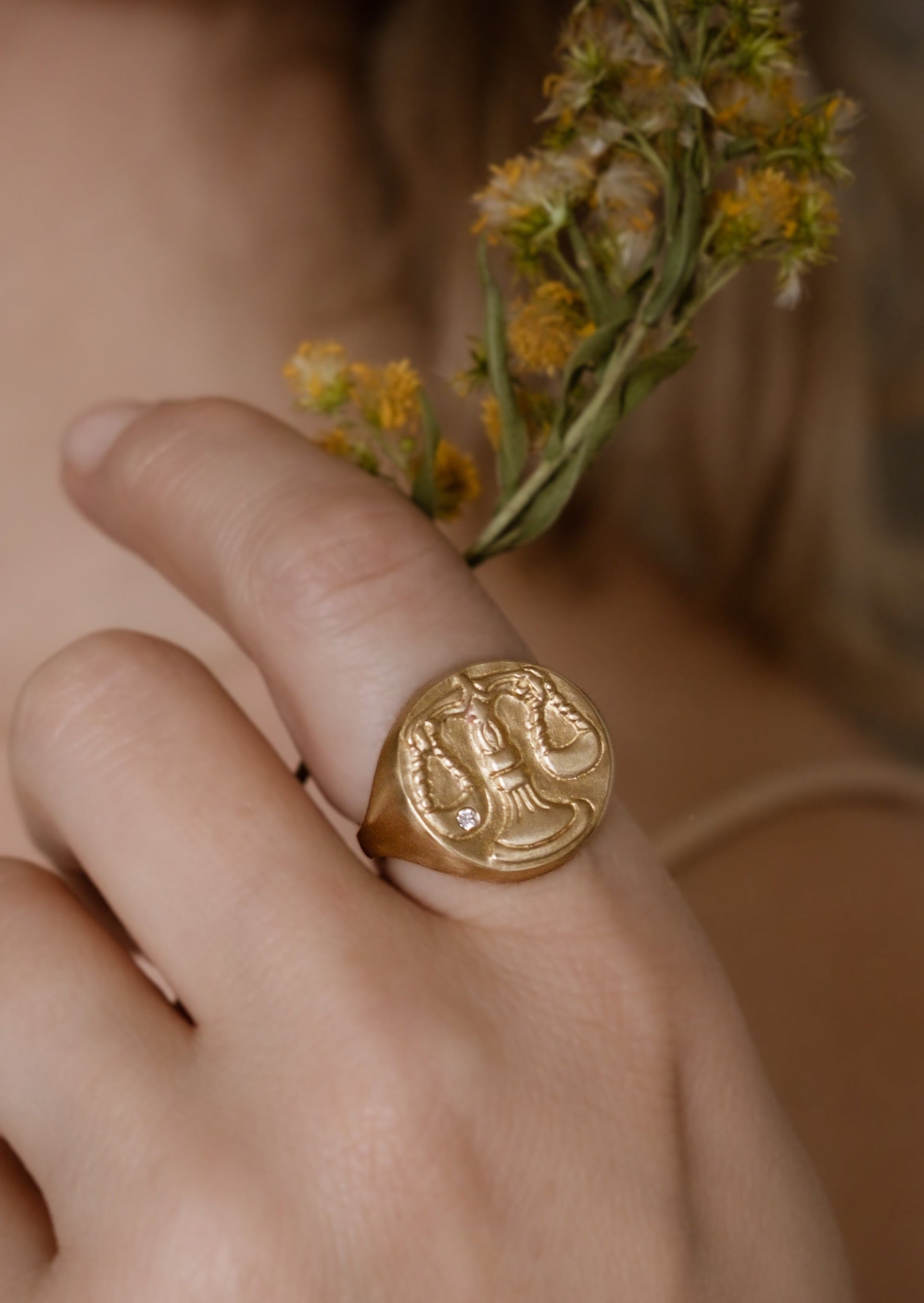 The seventh sign of the Zodiac, air sign Libra is an egalitarian peacemaker in search of harmony.  Hand-carved scales of justice grace this pendant, creating a necklace that captures the power of the celestial sky.