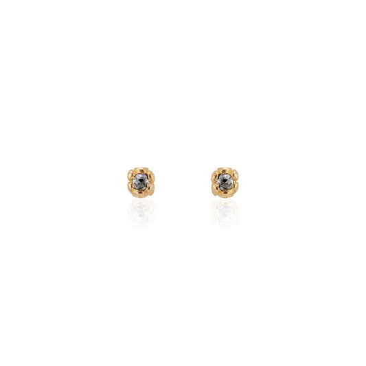 Inspired by a set of rings purchased for a childhood crush, the Bey earrings merge the simplicity of days past with a refined sophistication. Hand-crafted gold petals form a cocoon around a stunning rose cut diamond, creating delicate earrings perfect for celebrating the everyday. 