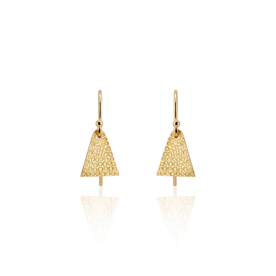 Evocative of the tassel rings worn by a beloved aunt, the triangular shape of the Burr earring represents the strength of the woman who inspired it. An intricate hand-crafted texture plays up the light with each turn of the head. 