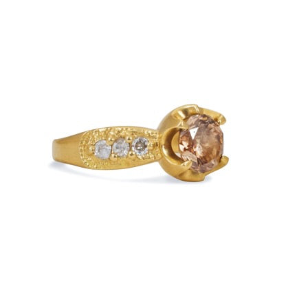 Inspired by the mesmerizing solo by musician Maxence Cyrin, the Gradiva ring embodies both the resonant chords and whimsical trills of the piano in a piece that marries substance with ethereal beauty. Brilliant inlaid diamonds adorn the band of the ring as a precious fancy diamond sits prominently within the gold prongs—an heirloom-worthy ring to be cherished for generations.