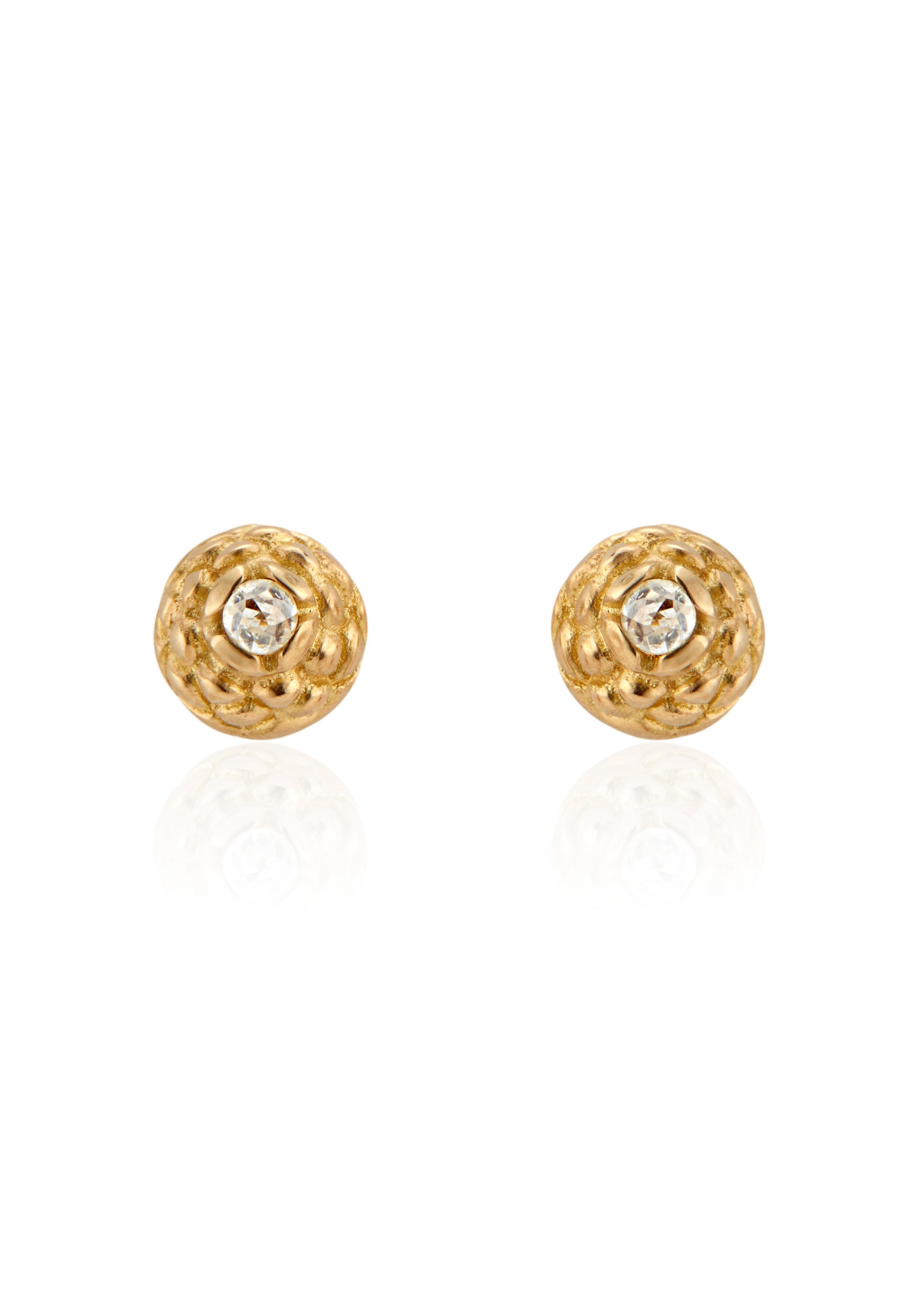 Featuring intricate hand-carved beads that center around brilliant rose cut diamonds, the Marquis earring is fit for royalty and reimagined for everyday wear. 