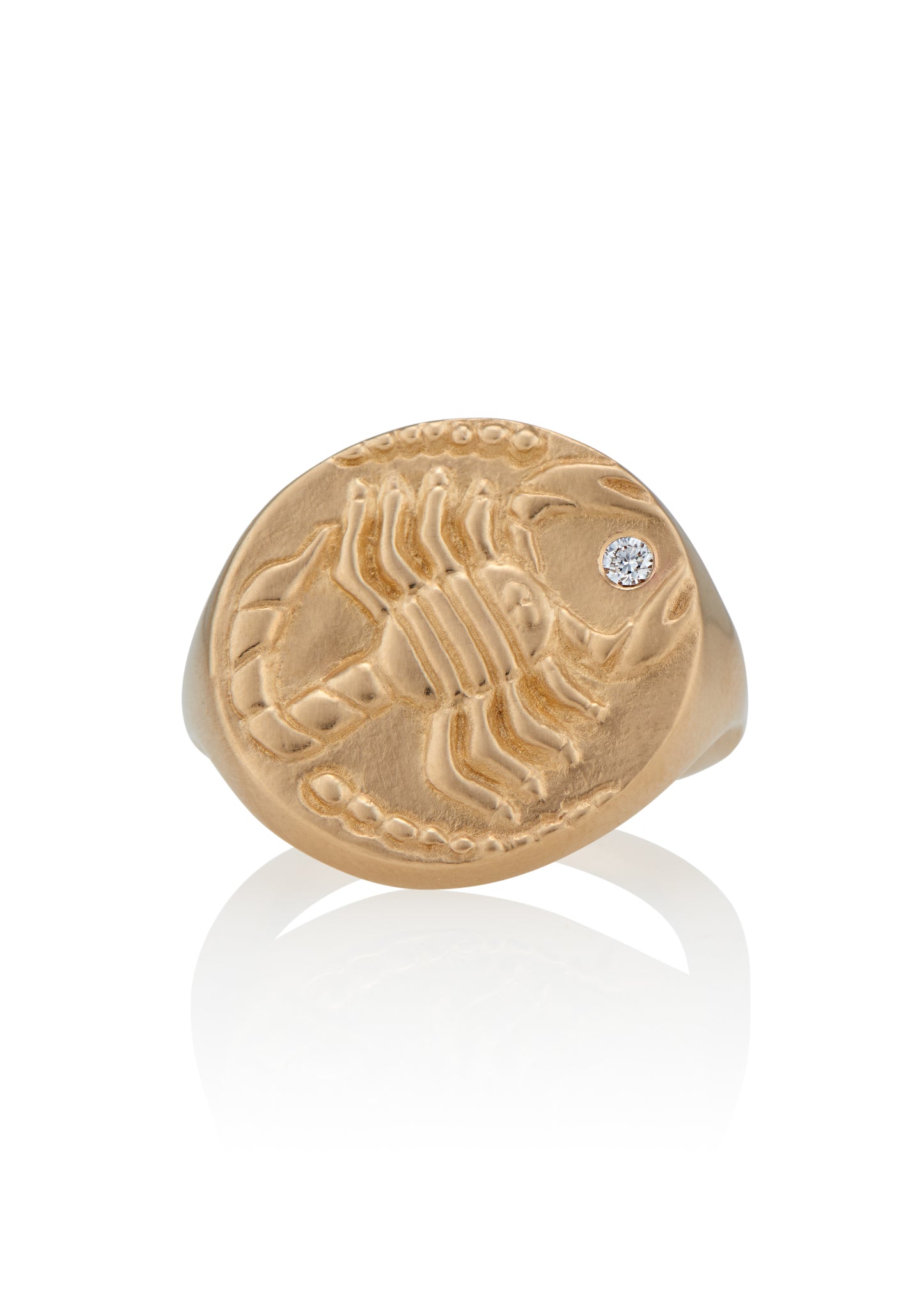 The eighth sign of the Zodiac, water sign Scorpio is a passionate truth-seeker who leads with decisiveness. A hand-detailed, fierce yet whimsical scorpion is accented with a precious diamond for a ring that captures the power of the celestial sky.