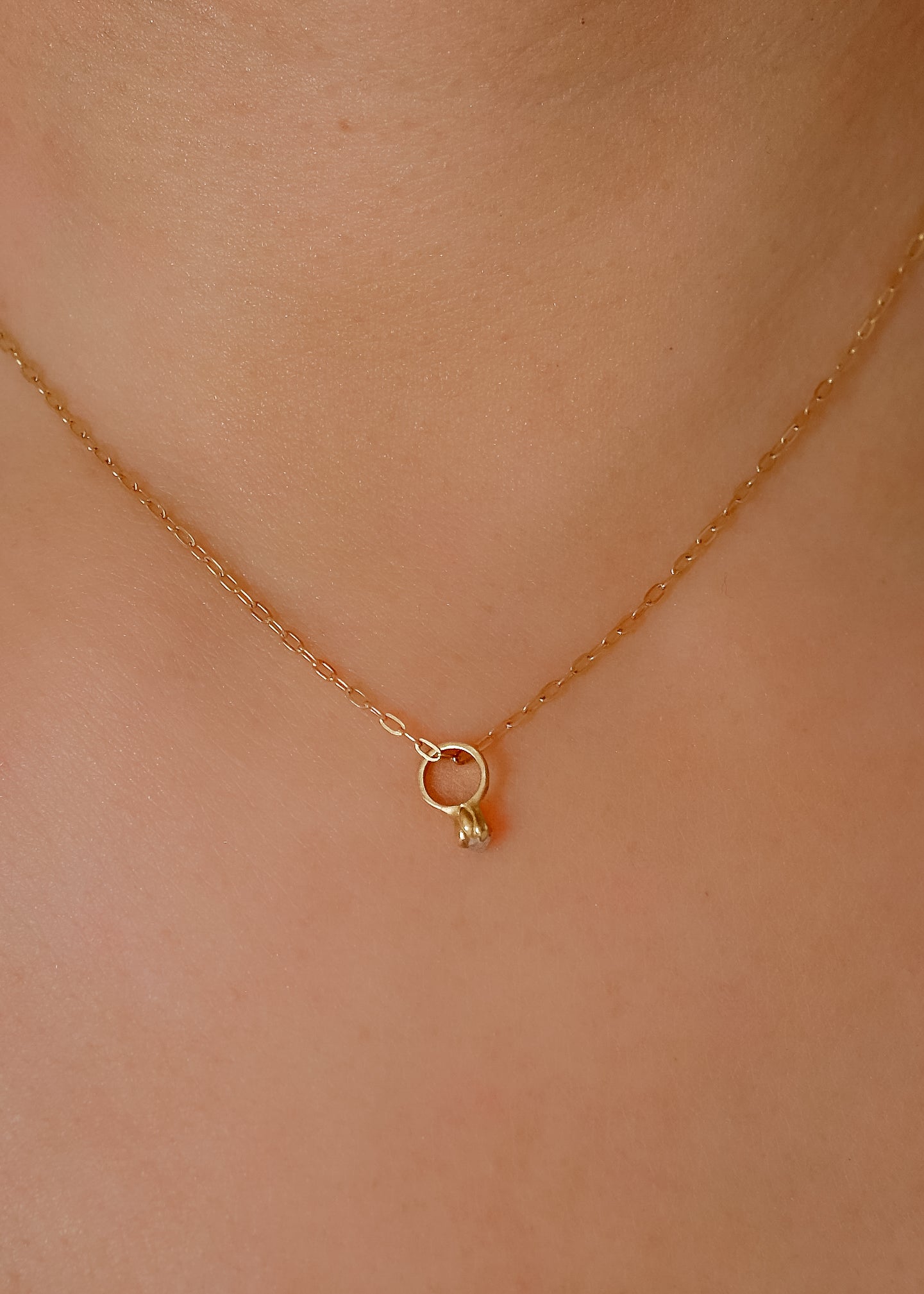 Inspired by a set of rings purchased for a childhood crush, the Bitty Diamond Ring necklace features a delicate gold ring-shaped pendant, hand-crafted with intricate detail to reveal a stunning diamond crown. Perfect for celebrating new motherhood, sisterhood, friendship or love in bloom, the Bitty captures the magic of innocent childhood days, infused now with refined sophistication. 