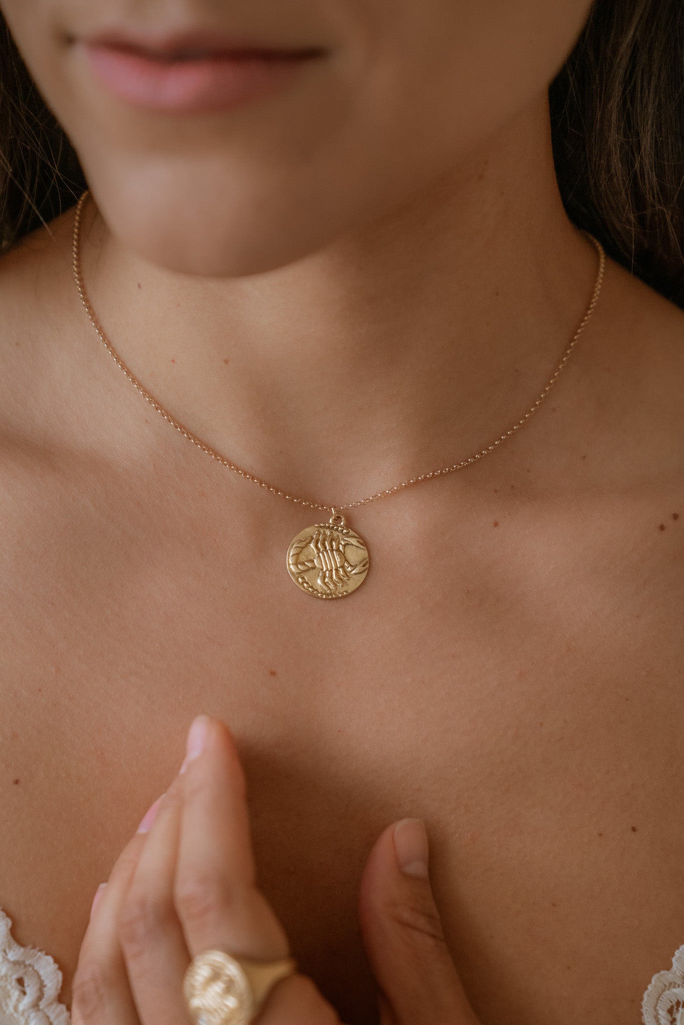 The eighth sign of the Zodiac, water sign Scorpio is a passionate truth-seeker who leads with decisiveness. A hand-carved, fierce yet whimsical scorpion graces this pendant, creating a necklace that captures the power of the celestial sky.