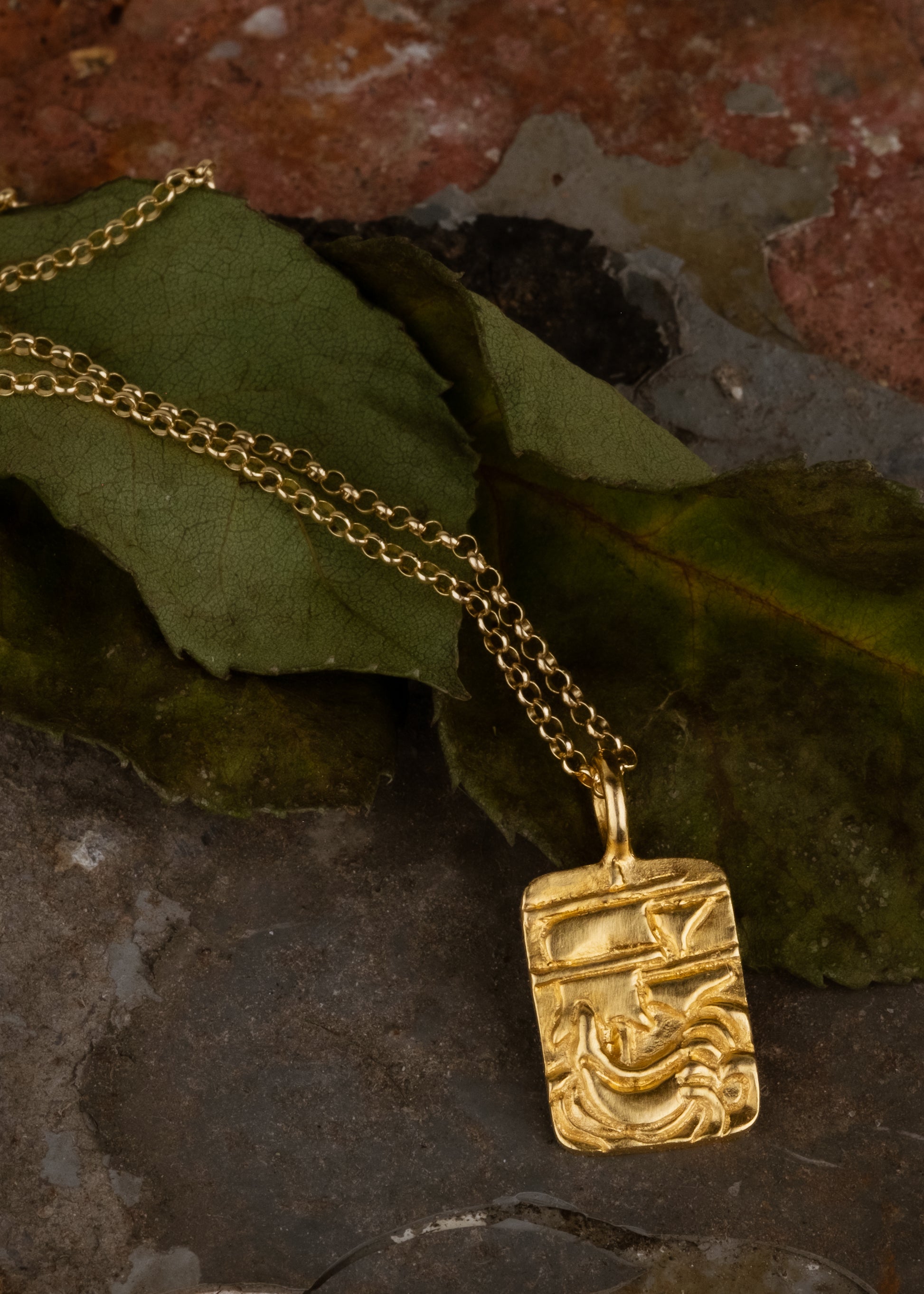 Arising from the swells of a stormy sea, the hand-carved ship of the Phantom necklace graces this substantial rectangular pendant— a timeless piece that echoes the mythic adventures of days past. 