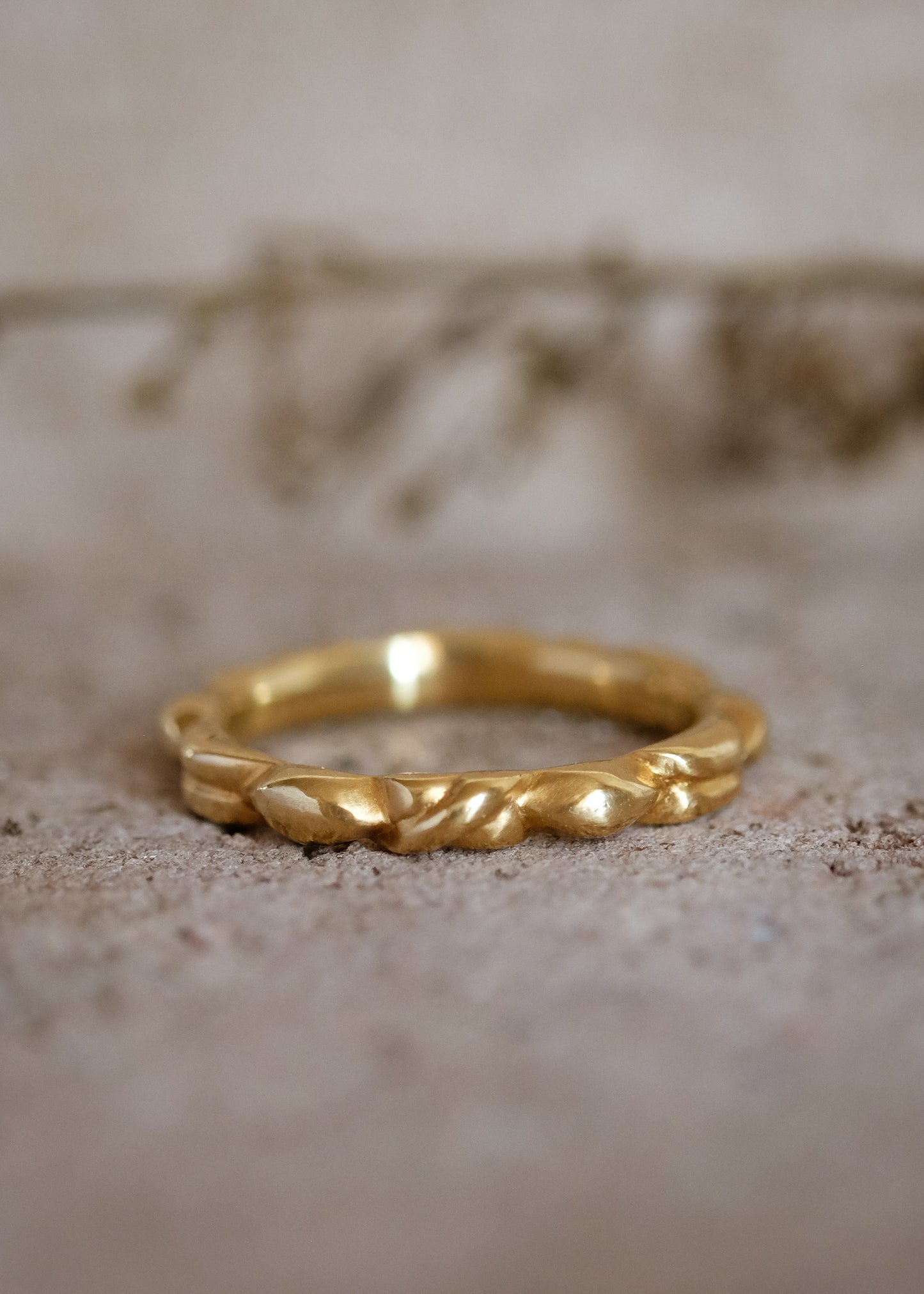 Out of many, one. The hand-carved Sheaf ring creates a woven braid pattern out of a single band of gold—a piece at once current and timeless.
